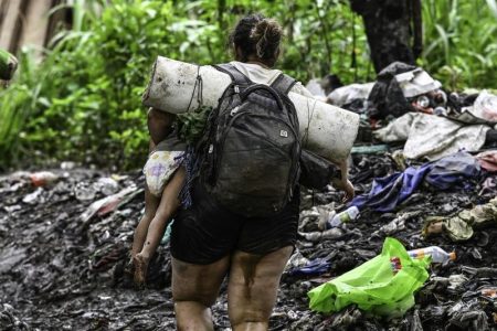 Venezuelan migrants arrive at Canaan Membrillo village, the first border control of the Darien province in Panama, on Oct 13, 2022. A substantial hike in children crossing the Darien jungle – linking Panama with Colombia – is expected this year, the United Nations said on Feb 17, 2023. (PHOTO / AFP)