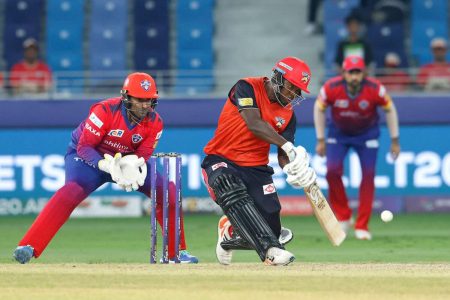 Sherfane Rutherford of Desert Vipers on the attack against Dubai Capitals