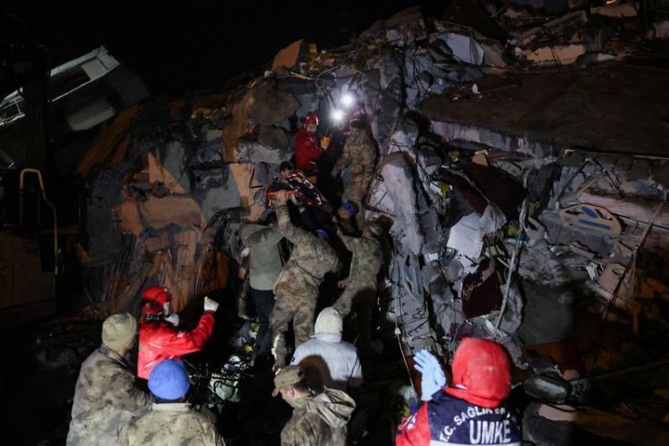 Cennet Sucu is rescued from the rubble of collapsed hospital, following an earthquake in Iskenderun, Turkey February 6, 2023. REUTERS/Umit Bektas