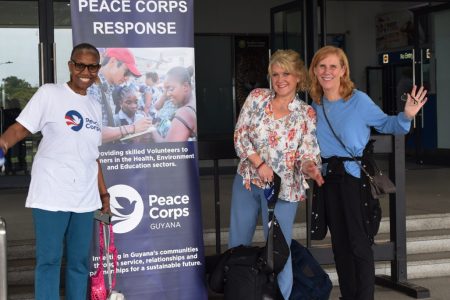 The three Peace Corps volunteers (US Embassy photo)