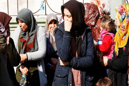Women gather and grieve for the loss of family members, following the deadly earthquake in Reyhanli, Turkey, February 12, 2023. (Reuters photo)
