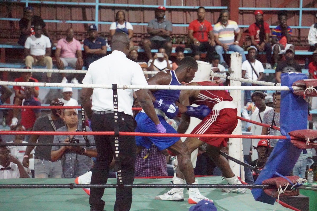 Sportsman-of-the-Year, Desmond ‘Dynamite’ Amsterdam provided a reminder of his pugilistic pedigree when he detonated against his middleweight rival, Nickelle Joseph of Trinidad and Tobago. (Emmerson Campbell photo)