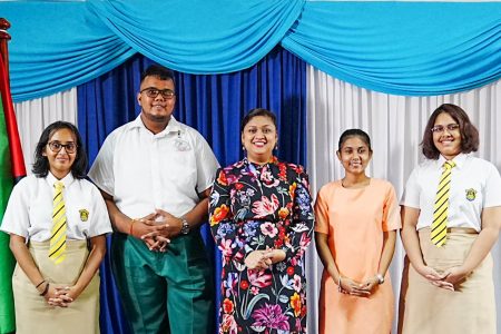 From left are: Sheridan Dyal of Queen’s College, Uotam Heeralall of the Anna Regina Secondary School, Minister of Education, Priya Manickchand, Atishta Seenarine of the Saraswati Vidya Niketan School and Saskia Twahir of Queen’s College. (Ministry of Education photo)