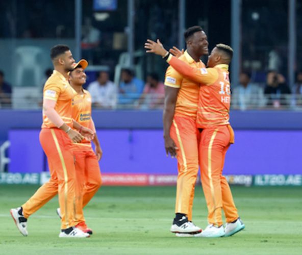 Carlos Brathwaite (third from left) celebrates with Gulf Giants teammates including Shimron Hetmyer (right) after taking a wicket against Desert Vipers in the final of the ILT20 on Sunday at the Dubai International Cricket Stadium in Dubai, United Arab Emirates. (ILT20 photo) 