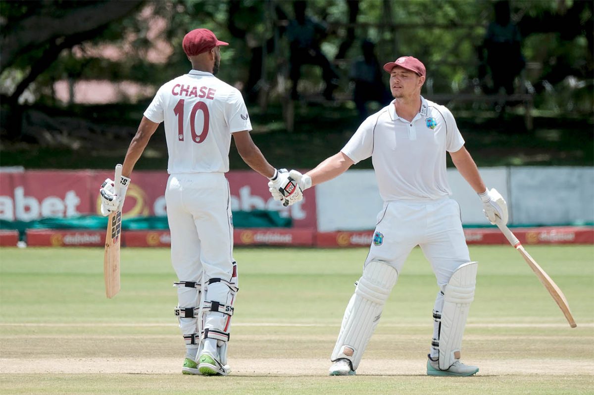 Roston Chase, left and Joshua Da Silva during their 85-run, sixth wicket partnership for the West Indies.