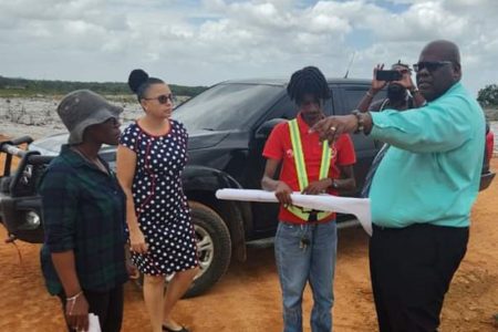 Sherwyn Greaves (right) at the site yesterday (CHPA photo)