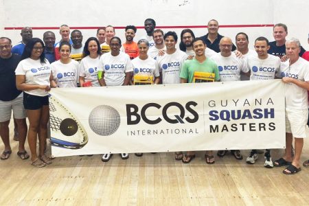 The respective winners and runners-up at the conclusion of the BCQS Masters squash tournament Saturday at the Georgetown Club.