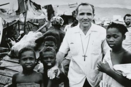 Ferdinand Mahfood visits Cité Soleil in Port-au-Prince, Haiti, in the early days of Food For The Poor in the 1980s. – Photo/Food For The Poor