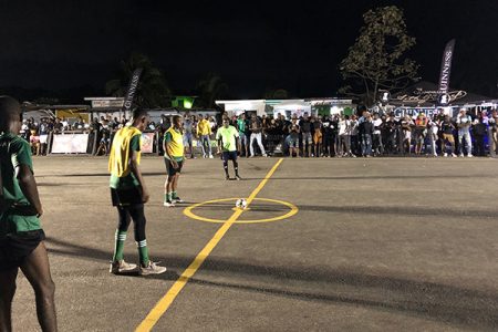 Pressure! Kevin Cummings of Jetty Gunners moments before netting the winning penalty against Up Like 7 to seal his team’s semi-final place in the Guinness ‘Greatest of the Streets’ West Demerara Championship at the Pouderoyen Tarmac