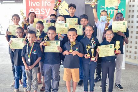 The top performers of the Guyana Chess Federation U14 tournament with their prizes