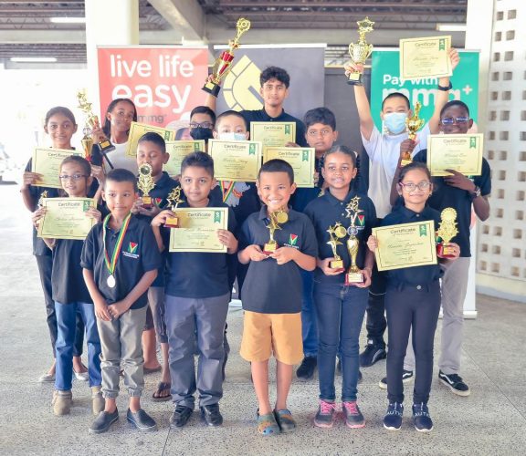 The top performers of the Guyana Chess Federation U14 tournament with their prizes