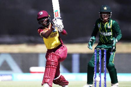 Rashada Williams hits down the ground during her top score of 30 for West
Indies on Sunday. (Photo courtesy ICC Media) 