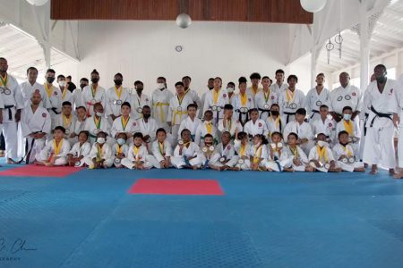 Participants pose for the camera following the conclusion of the ASK-G National Championships at the YMCA auditorium 