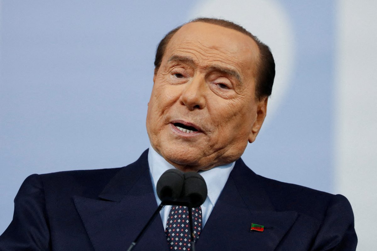 FILE PHOTO: Forza Italia leader Silvio Berlusconi speaks during the closing electoral campaign rally of the centre-right's coalition in Piazza del Popolo, ahead of the September 25 general election, in Rome, Italy, September 22, 2022. REUTERS/Yara Nardi/File Photo