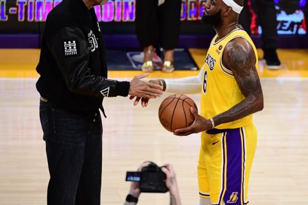 NEW CAPTAIN! Basketball great Kareem Abdul Jabbar congratulates LeBron James after he broke Jabbar’s  record for the most points scored in NBA history Tuesday night. 