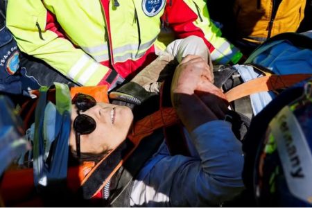 Rescuers carrying  Zeynep, following her rescue. REUTERS/Piroschka van de Wouw