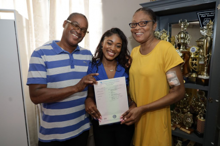 Parents Jay Roberts, left, and Lystra are bursting with joy and pride as they celebrate their daughter Jilisse Roberts’ latest achievement. Jilisse won an additional scholarship in Modern Studies for CAPE 2022.
