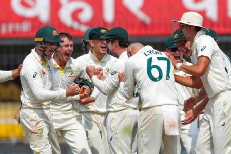 Australia’s Nathan Lyon (no.67) celebrating with teammates after recording figures of 8-64 to bowl India out for 163 in the 3rd Test
