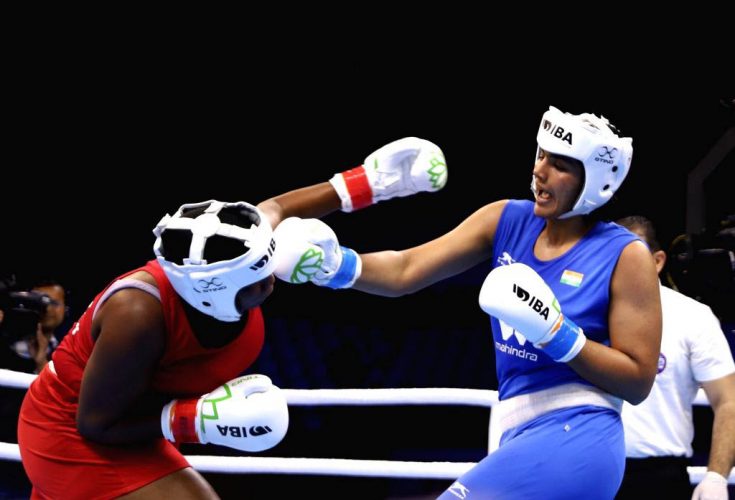 Nupur Sheoran of India lands a crisp right hand to the face of Guyana’s Abiola Jackman who suffered a unanimous decision loss in her opening round-of-16 bout at the ongoing International Boxing Association (IBA) Women’s World Boxing Championships in India yesterday.