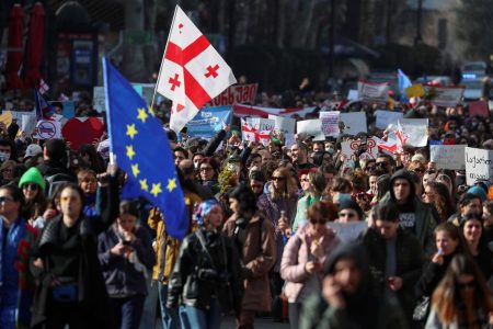 Participants march during a protest against a draft law on "foreign agents", which critics say represents an authoritarian shift and could hurt Georgia's bid to join the European Union, in Tbilisi, Georgia, March 8, 2023. REUTERS/Irakli Gedenidze