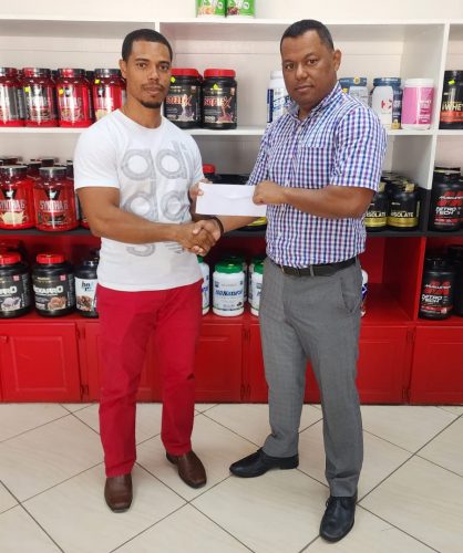 Yesterday, Manager of Fitness Express, Ian Rogers handed over a sponsorship cheque to Treasurer of the bodybuilding federation, Eybo Orford to help offset expenses of the event
