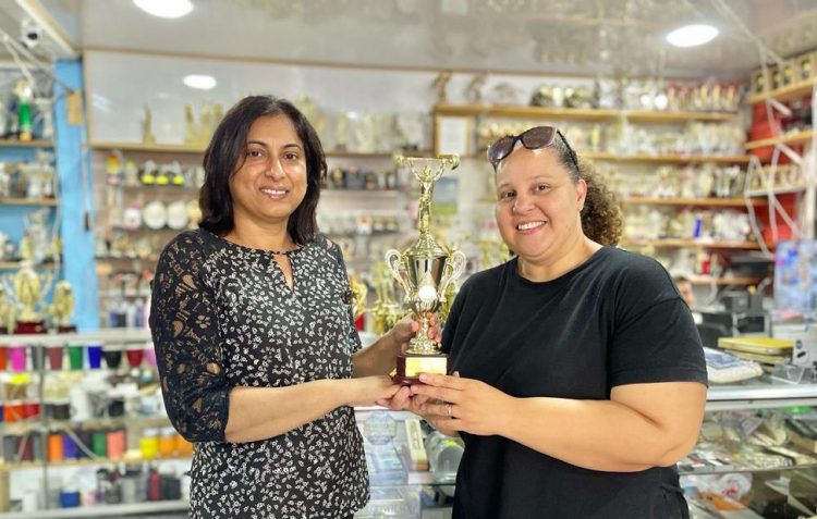 Trophy Stall’s representative, Devi Sunich, handing over the trophies to Jordana Ramsey-Gonsalves