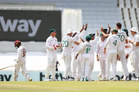 The SA team celebrating the dismissal of Tagenarine Chanderpaul for 10 in the second innings of the 1st Test
