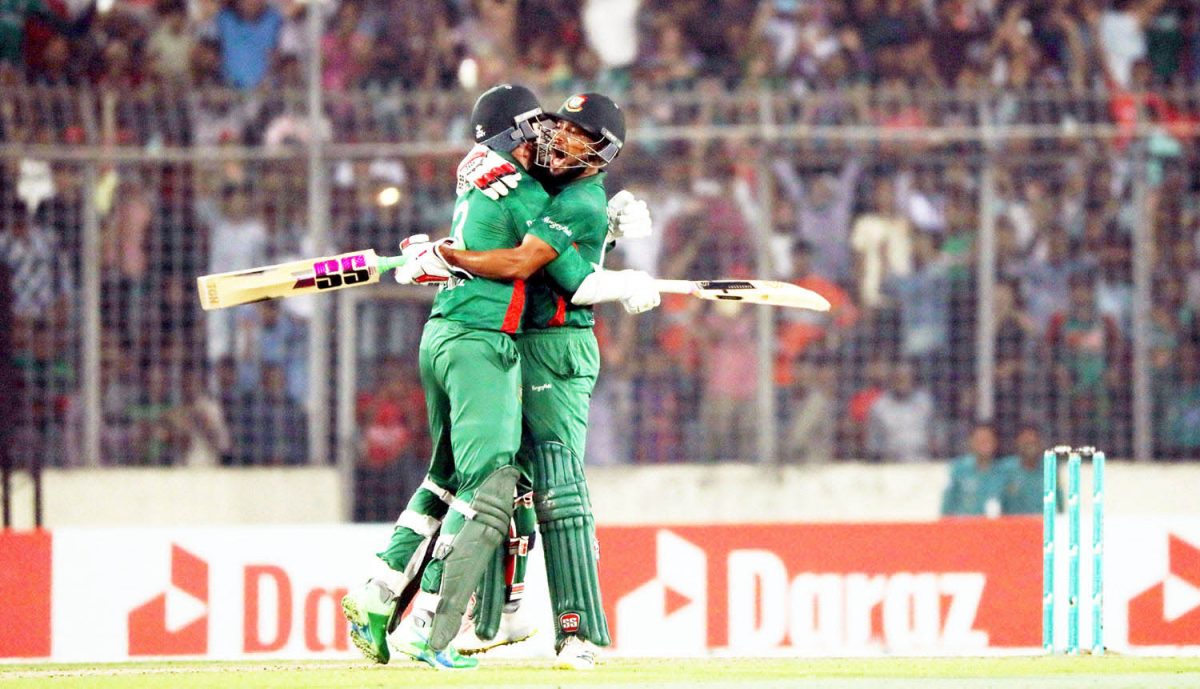 Bangladesh’s Taskin Ahmed and Najmul Hossain Santo celebrate their team’s victory