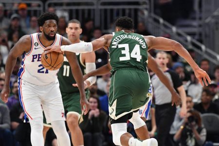 Milwaukee Bucks forward Giannis Antetokounmpo (34) drives to the basket against Philadelphia 76ers center Joel Embiid (21) in the second half at Fiserv Forum. Mandatory Credit: Michael McLoone-USA TODAY Sports