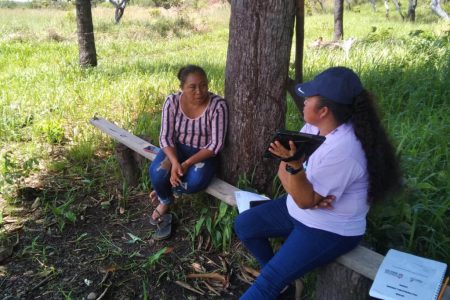 An enumerator takes information from a hinterland resident (Bureau of Statistics photo)