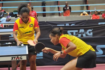  Guyana’s Chelsea Edghill and Natalie Cummings during their women’s doubles match against Yasiris Ortiz and Esmerlyn Castro.