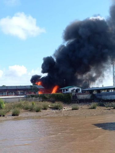 The fire as seen from the Essequibo River.