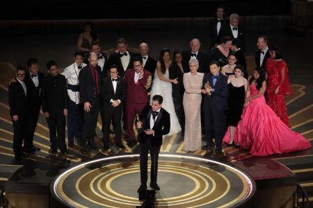 Daniel Kwan, Daniel Scheinert and Jonathan Wang win the Oscar for Best Picture for "Everything Everywhere All at Once" during the Oscars show at the 95th Academy Awards in Hollywood, Los Angeles, California, U.S., March 12, 2023. REUTERS/Carlos Barria