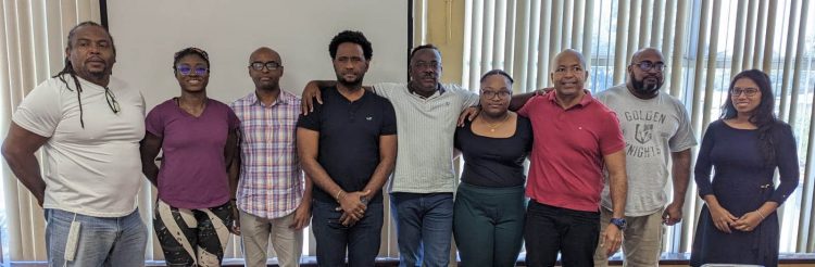 New GAPLF President, Franklin Wilson (center) flanked by Executive Committee Members from left, Roger Rogers, Keisha Abrigo, Maxwell Denny, DenroyLivan, Zanele Chase, Henry Chase, Farouk Abdool and Returning Officer, Mrs. Vidushi Persaud-McKinnon