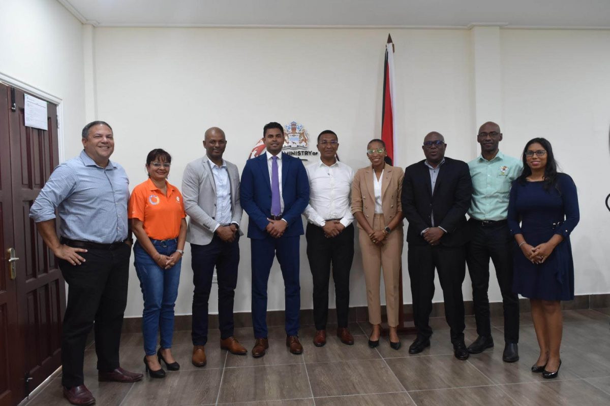 Minister Charles Ramson Jnr., and the Executive Committee of the Guyana Olympic Association following Tuesday’s meeting. From left, Philip Fernandes, Emelia Ramdhani, Godfrey Munroe, Ramson Jnr., Kashif Muhammad, Chairman of the National Sports Commission, Cristy Campbell, Steve Ninvalle, Garfield Wiltshire and Vidushi Persaud-Mc Kinnon.
