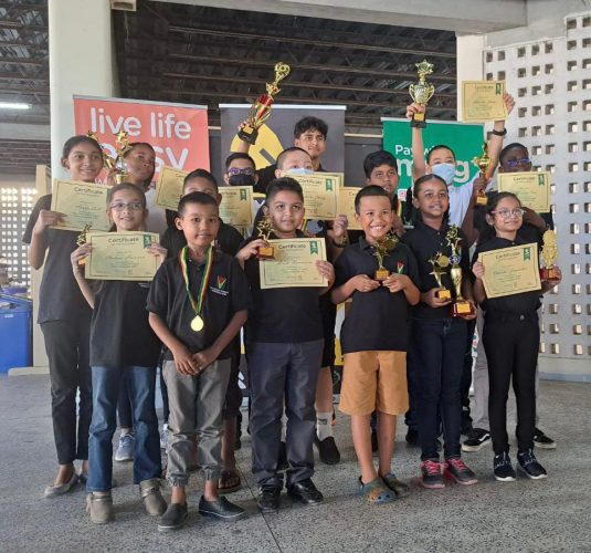 Winners of the National Under-14 and Under Chess Championships held at Queen’s College recently