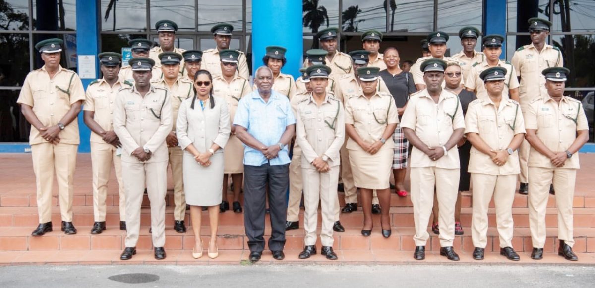 The Guyana Prison Service yesterday opened its three day officers’ conference under the theme ‘Promoting Rehabilitation and Societal Reinte-gration of Inmates’. The objectives of the conference include creating synergies at the managerial level and to build cohesive and coherent strategies for performance improvement in 2023 among others. In this photograph prison officers including Director of Prisons Nicklon Elliot are seen with Ministry of Home Affairs Robeson Benn and the ministry’s Permanent Secretary Mae Toussaint Jr. (Guyana Prison Service photo)