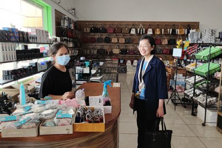 China’s Ambassador to Guyana, Guo Haiyan visiting a Lethem store (Chinese Embassy photo)