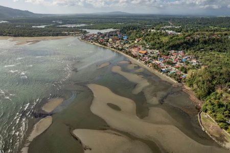 An aerial view shows the oil spill from the sunken fuel tanker MT Princess Empress on the shores of Pola, in Oriental Mindoro province, Philippines, March 8, 2023. REUTERS/Eloisa Lopez