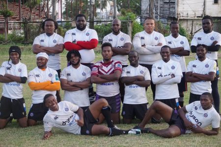 The rampant Panthers rugby outfit pose for a photo following their 45-26 mauling of GDF when the Guyana Rugby Football Union (GRFU) 12’s tournament  continued yesterday at the National Park. (Emmerson Campbell photo)