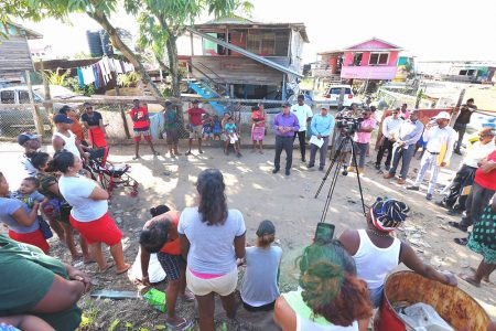Minister of Housing Collin Croal meeting with residents of Parika Sea Dam 