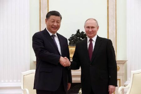Russian President Vladimir Putin (right) shakes hands with Chinese President Xi Jinping during a meeting at the Kremlin in Moscow, Russia, March 20, 2023. Sputnik/Sergei Karpukhin/Pool via REUTER