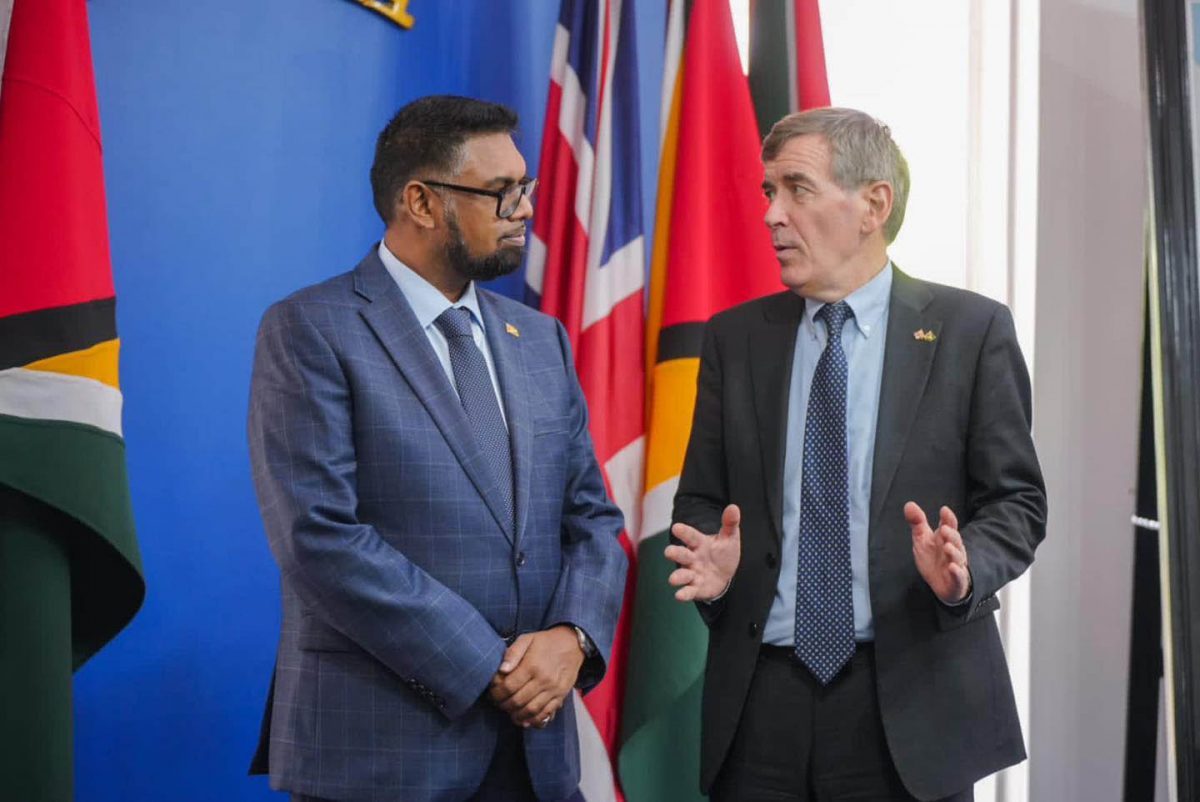 United Kingdom Parliamentary Under-Secretary of State for the Americas and Caribbean, David Rutley (right) meeting with President Irfaan Ali yesterday at State House (Office of the President photo)