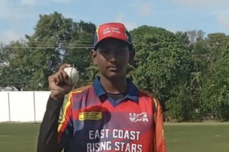 Demerara’s under-15 captain, Mickel Sharma
