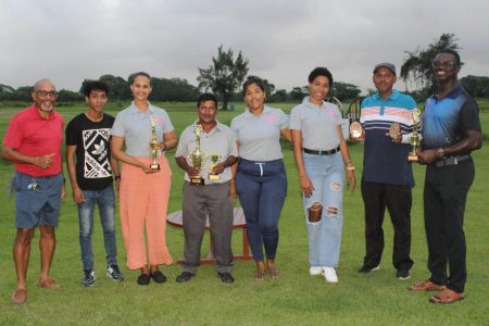 Mike Mangal (fourth from left) displays his trophies along with other
winners and representatives of Trophy Stall and LGC.