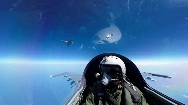 A pilot is photographed operating an aircraft of the Air Force under the Eastern Theatre Command of China’s People’s Liberation Army (PLA) during a combat readiness patrol and “Joint Sword” exercises around Taiwan, at an undisclosed location in this handout image released on April 8, 2023. (Eastern Theatre Command/Handout via REUTERS)