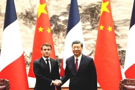 French President Emmanuel Macron (left) shakes hands with Chinese President Xi Jinping during a joint meeting of the press at the Great Hall of the People in Beijing April 6, 2023. — Pool pic via AFP