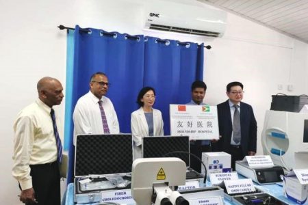 Officials of the Guyana Government and the Chinese Embassy with the equipment (Photo: Chinese Embassy in Guyana)
