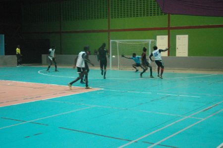 Goal! Anthony Forrester of BV scoring the solitary goal against Gold is Money to clinch the win in the One Guyana Futsal Championship
