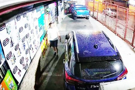 Murdered Bing Zhu Zhang shown on CCTV footage moments before his killing.